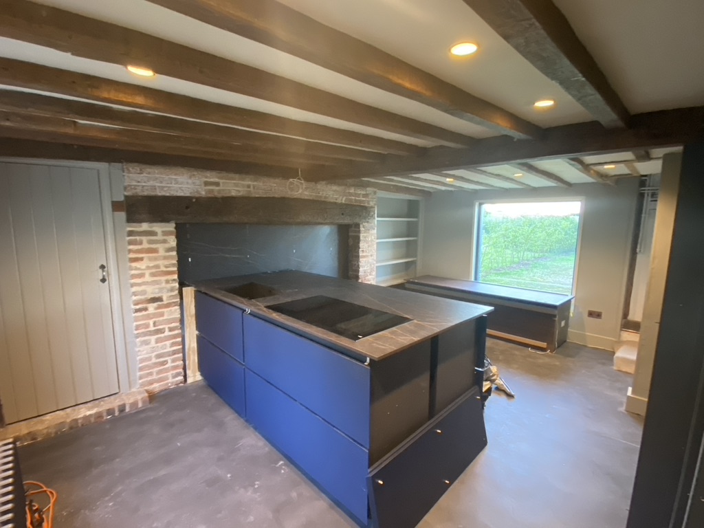 16th Cottage renovation with contemporary kitchen - microcemnt floor, picture wind, lime plaster and pointing 